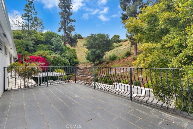 view of patio / terrace featuring a balcony