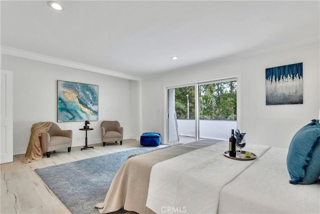 bedroom with access to outside, ornamental molding, and wood-type flooring