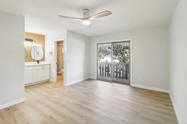 unfurnished room with light hardwood / wood-style floors and ceiling fan