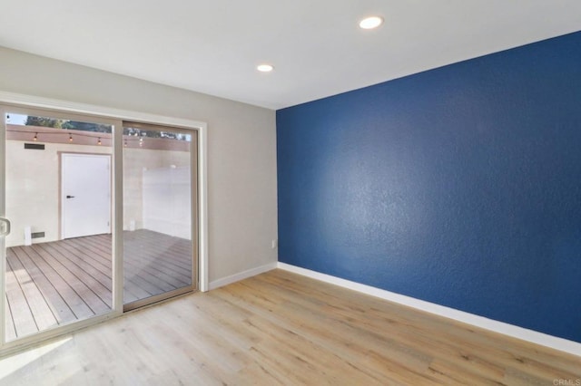 empty room featuring light hardwood / wood-style floors