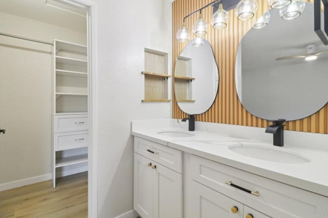 bathroom featuring vanity and hardwood / wood-style floors