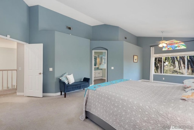 bedroom with lofted ceiling and carpet flooring