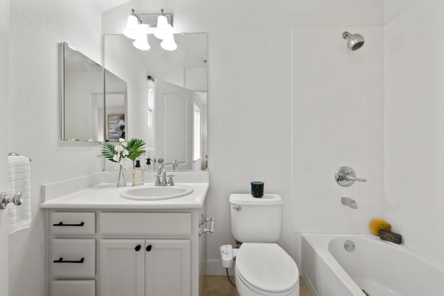 full bathroom featuring  shower combination, vanity, and toilet