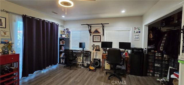 home office with wood finished floors, visible vents, and recessed lighting