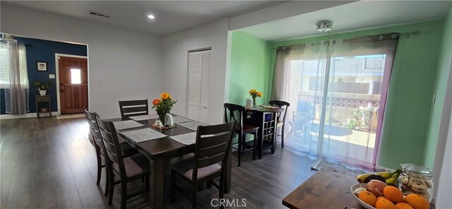 dining area featuring recessed lighting, visible vents, and dark wood finished floors