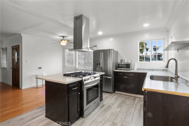 kitchen with sink, appliances with stainless steel finishes, ornamental molding, light hardwood / wood-style floors, and island exhaust hood