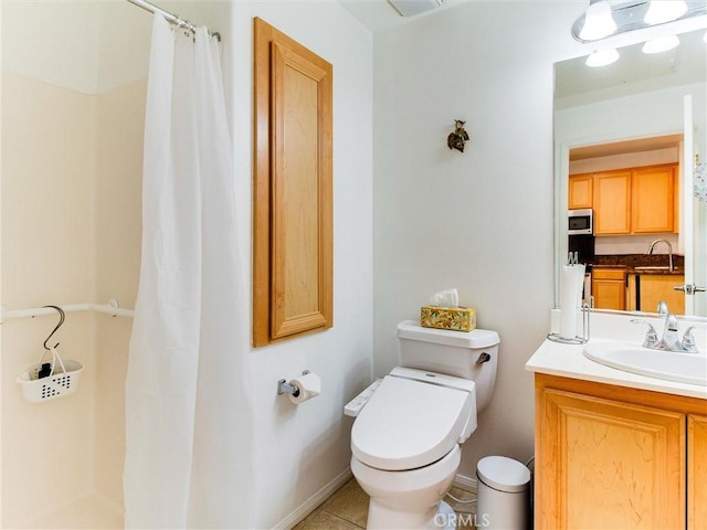 bathroom featuring vanity, a shower with curtain, tile patterned floors, and toilet