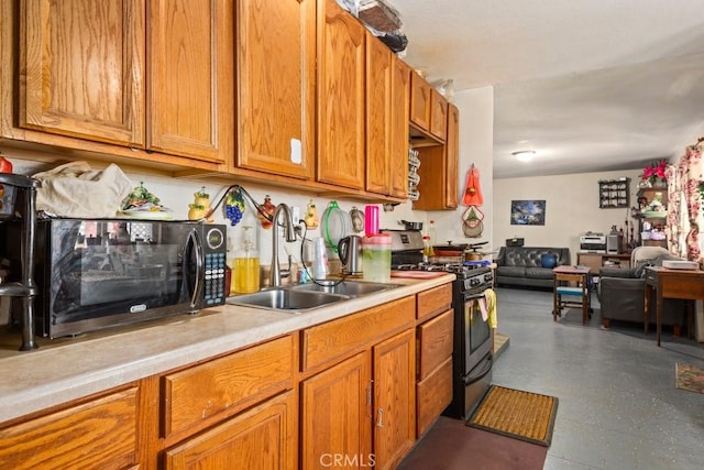 kitchen with sink and gas stove