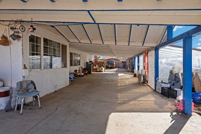 view of patio featuring ceiling fan