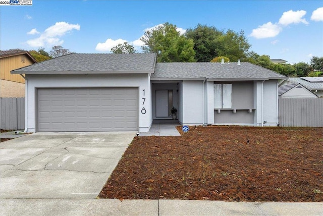 ranch-style home with a garage