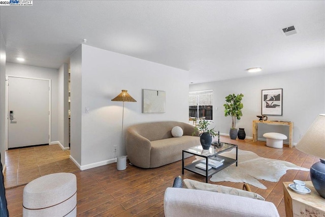 living room with hardwood / wood-style flooring