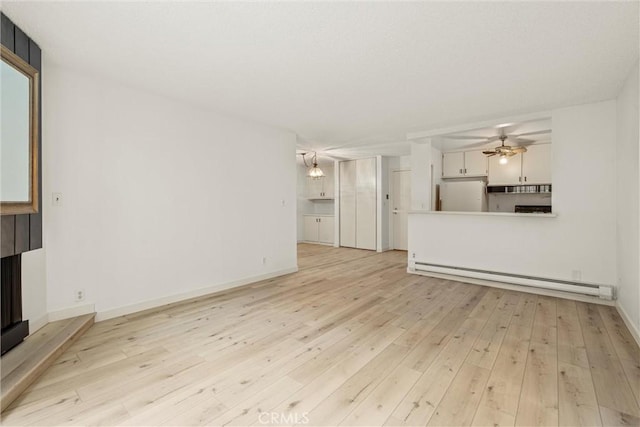 unfurnished living room with ceiling fan, light wood-type flooring, and baseboard heating