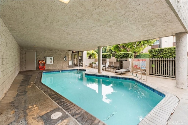 8740 Tuscany Ave Unit 109, Playa Del Rey, CA 90293 - indoor community pool featuring a patio area