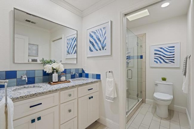 bathroom with crown molding, vanity, toilet, and walk in shower