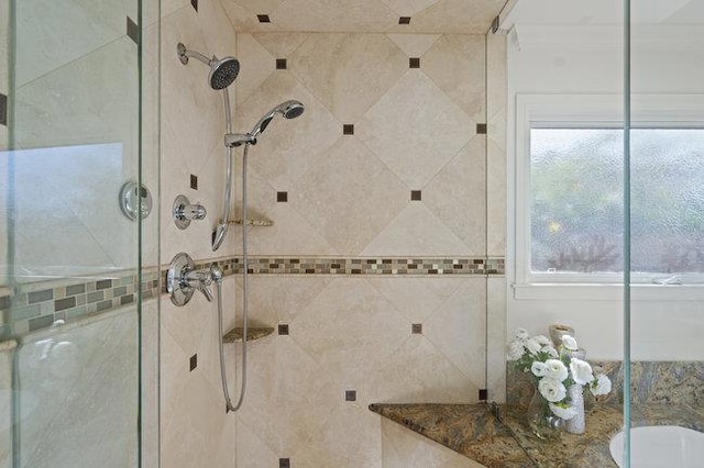 bathroom featuring an enclosed shower