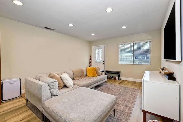 living room featuring light wood-type flooring