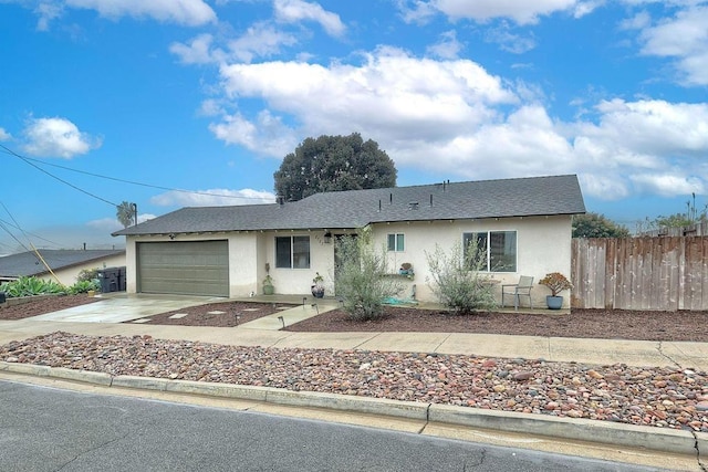 ranch-style home with a garage