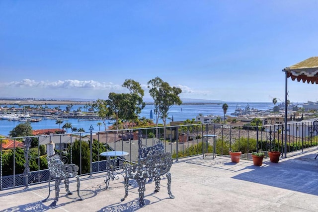 view of patio / terrace with a water view