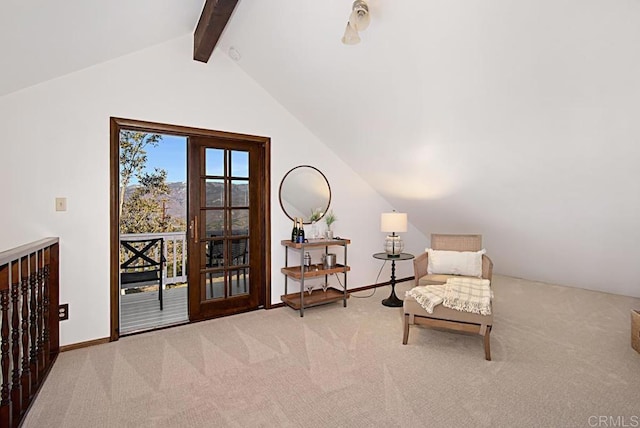 living area featuring light carpet and vaulted ceiling with beams