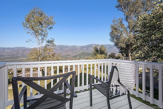 deck with a mountain view