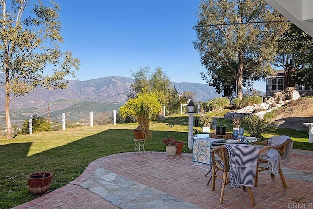 view of patio with a mountain view