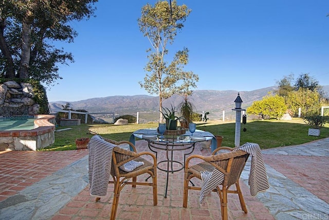 view of patio featuring a mountain view