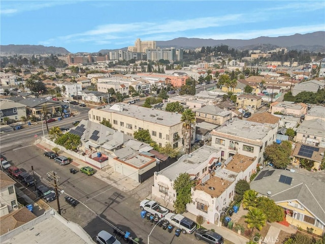 drone / aerial view featuring a mountain view