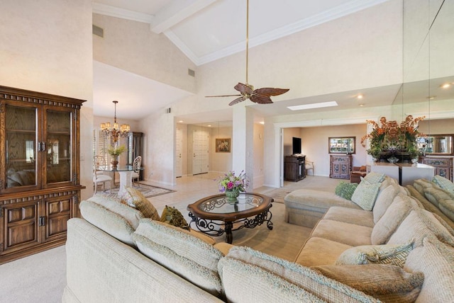 living room with crown molding, beam ceiling, a skylight, high vaulted ceiling, and ceiling fan with notable chandelier