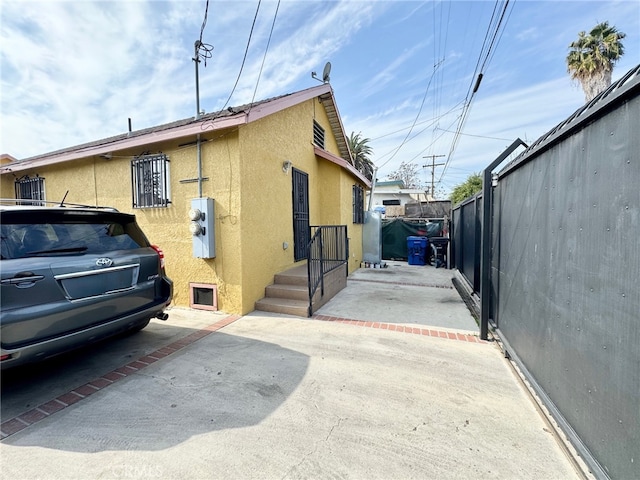 view of home's exterior featuring a patio