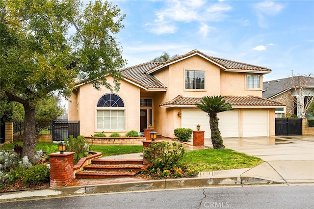 mediterranean / spanish-style house featuring a garage