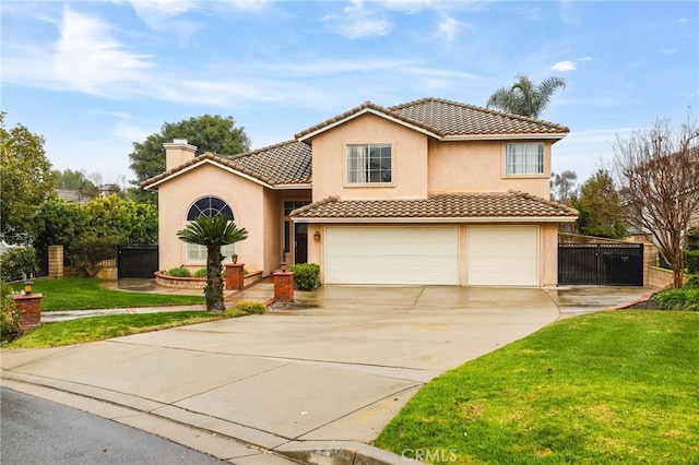 mediterranean / spanish house featuring a garage and a front lawn