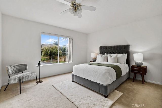 bedroom featuring ceiling fan and carpet flooring