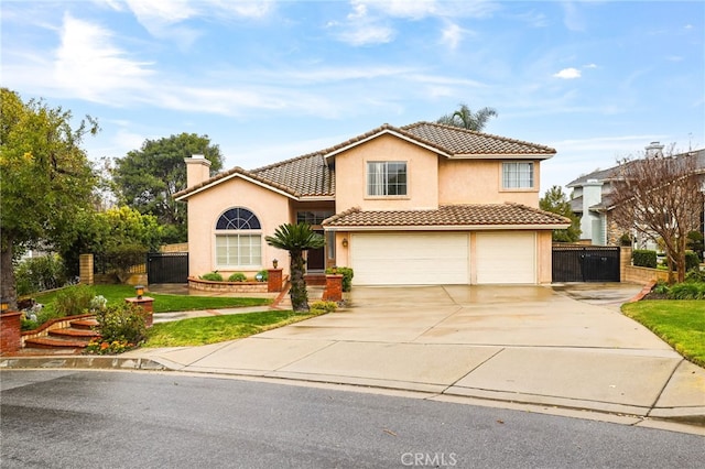 mediterranean / spanish-style house featuring a garage