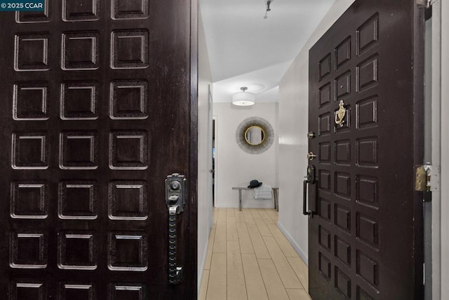 entrance foyer featuring light wood-type flooring