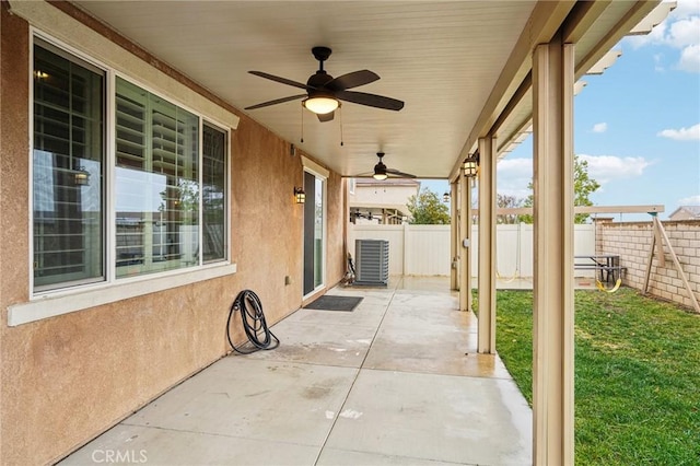 view of patio / terrace featuring a ceiling fan, a fenced backyard, and central air condition unit