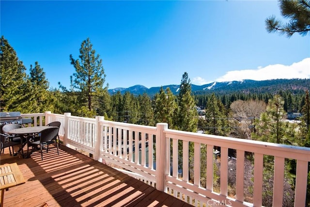 exterior space featuring a mountain view and a forest view