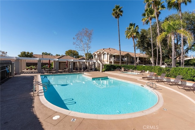 view of pool featuring a patio