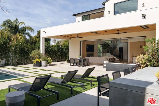 view of patio / terrace with outdoor lounge area and ceiling fan