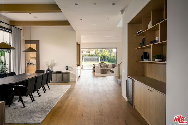 hall with light hardwood / wood-style floors