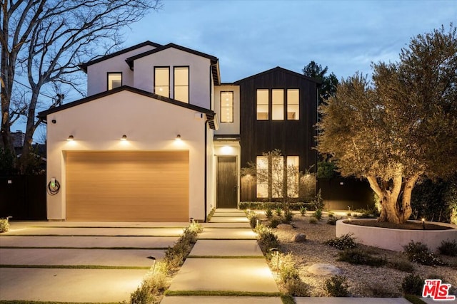 modern home featuring a garage