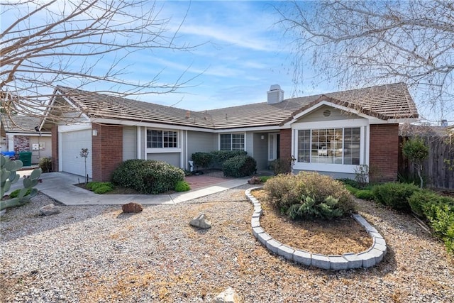 ranch-style house featuring a garage