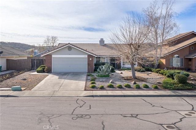 single story home with a garage