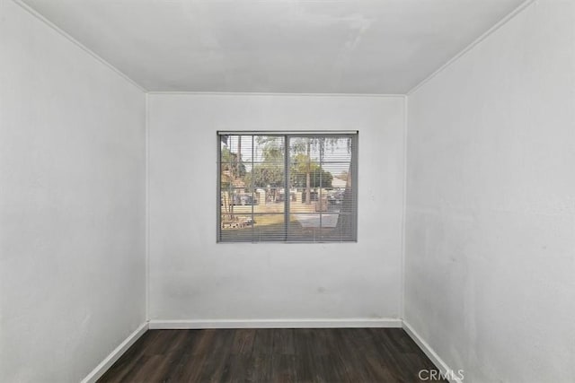 unfurnished room featuring dark wood-type flooring