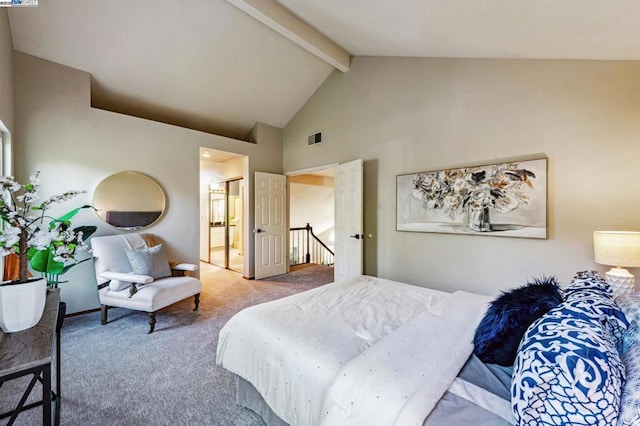 bedroom featuring beamed ceiling, carpet floors, high vaulted ceiling, and ensuite bath