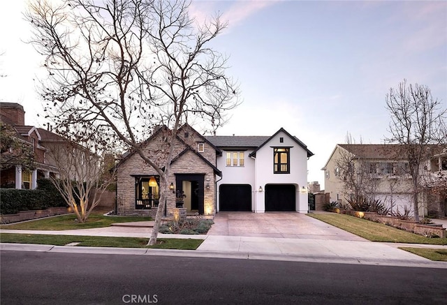 view of front of home with a garage