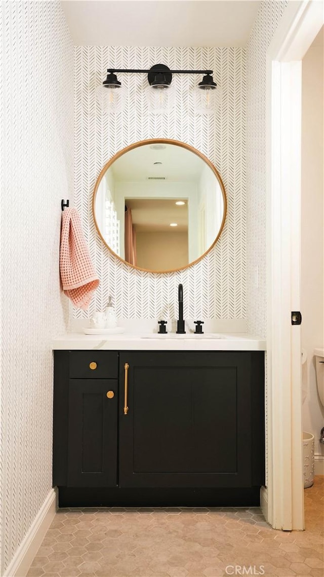 19 Basilica Pl, Ladera Ranch, CA 92694 - bathroom featuring vanity and wallpapered walls