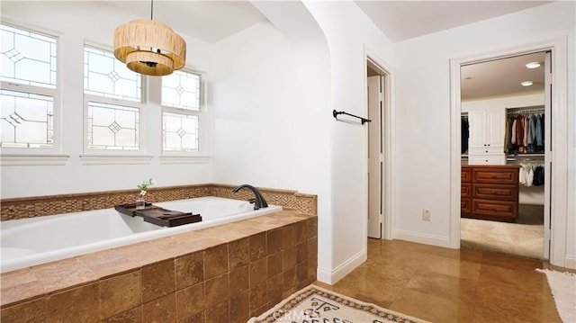 19 Basilica Pl, Ladera Ranch, CA 92694 - bathroom with a bath, a walk in closet, and tile patterned floors