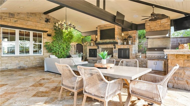 19 Basilica Pl, Ladera Ranch, CA 92694 - view of patio / terrace with an outdoor kitchen, a ceiling fan, an outdoor stone fireplace, and outdoor dining area