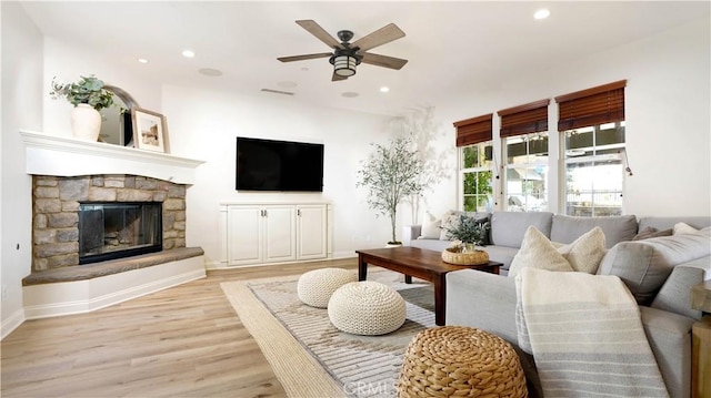19 Basilica Pl, Ladera Ranch, CA 92694 - living area with light wood finished floors, recessed lighting, a ceiling fan, and a fireplace