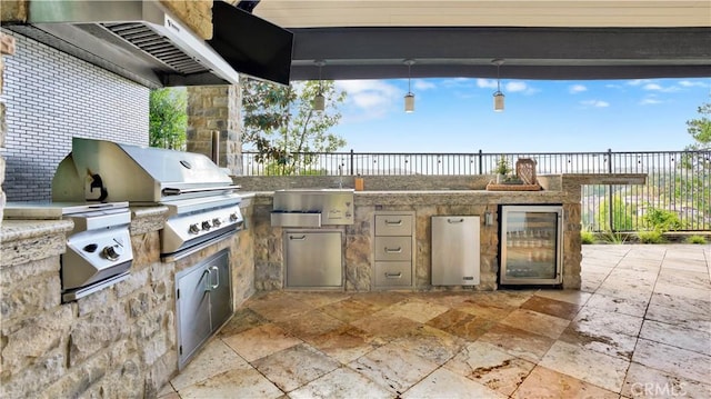 19 Basilica Pl, Ladera Ranch, CA 92694 - view of patio featuring wine cooler and area for grilling
